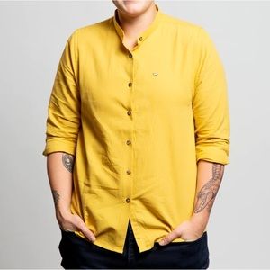 Peau De Loup yellow mandarin collar long sleeved shirt